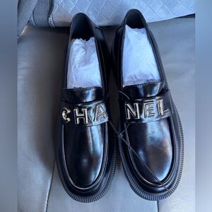 CHANEL Black Shiny Calfskin Leather Loafers Size 41 (US 10.5)